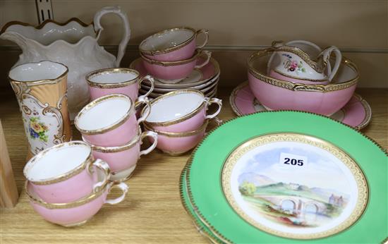 A 19th century English porcelain part tea set, named plates and a jug
